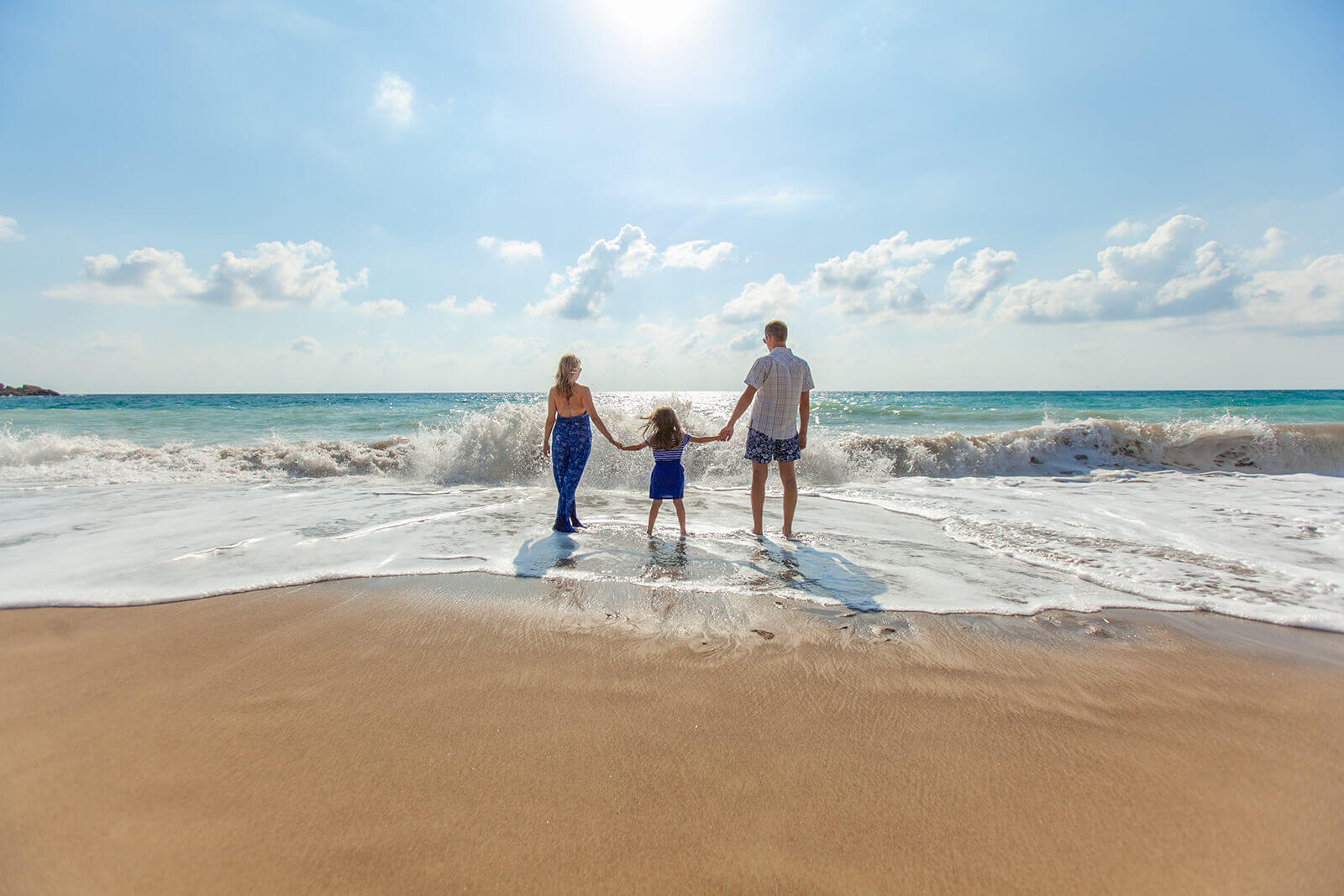 Family enjoying a nice day at the beach.